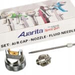 High-quality air spray gun set with nozzle, air cap and fluid needle for professional painting.